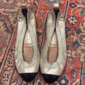 Silver and black Chanel flats